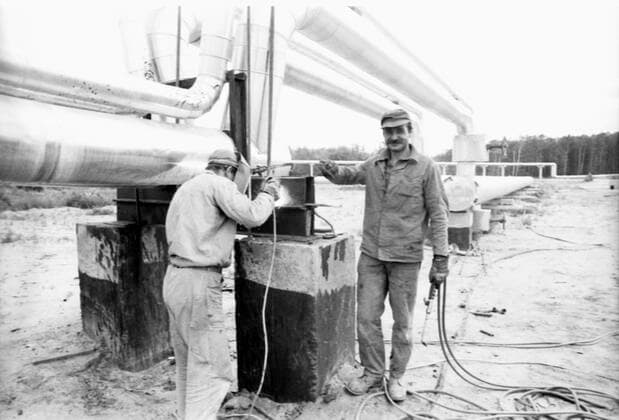 Khmelnytsky Nuclear Power Plant 8141081 01.07.1983 Ukrainian SSR. The construction of Khmelnytsky Nuclear Power Plant in Netishyn, Khmelnytsky Region. Khmelnytsky Nuclear Power Plant started as a joint Soviet-Polish project, with the agreement on cooperation in construction and use of the 750 kV Rzeszow (Poland) Khmelnytsky (USSR) powerline signed at a meeting of the Executive Committee of the Council for Mutual Economic Assistance in 1979. Welding operators E. Opolinsky and H. Deirpolsky work to assemble pipes. ???? ????? ??????????? Khmelnitsky region Ukraine  Copyright: x???? ?????x???????????x