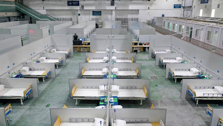(220329) -- SHANGHAI, March 29, 2022 -- Aerial photo taken on March 15, 2022 shows the interior of a makeshift hospital for COVID-19 patients in Changchun, capital of northeast China s Jilin Province. Xinhua Headlines: China acts swiftly to contain COVID-19 resurgence unreguser 