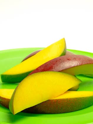 mango in cuts, model released, , property released, , 34574382.jpg, mango, cuts, stripes, fruit, sweet, red, juicy, deli, snack, healthy, vitamin, diet, food, fiber, fructose, offer, product, farmer, market, sale, harvest