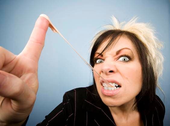 Portrait of a creative businesswoman stretching gum, on her fingertip, model released, , property released, , 428635.jpg, bold, bully, chewing, gum, goof, immature, irksome, juvenile, obnoxious, candy, confident, dye, hair, friendly, office, serious, spiky, portrait, eyes, face, smile, white-collar, creative, business, businesswoman, attitude, jacket, jewelry, lips, makeup, manager, white-collar, model, female, fingertip, woman, pretty, beautiful, aggressive,
