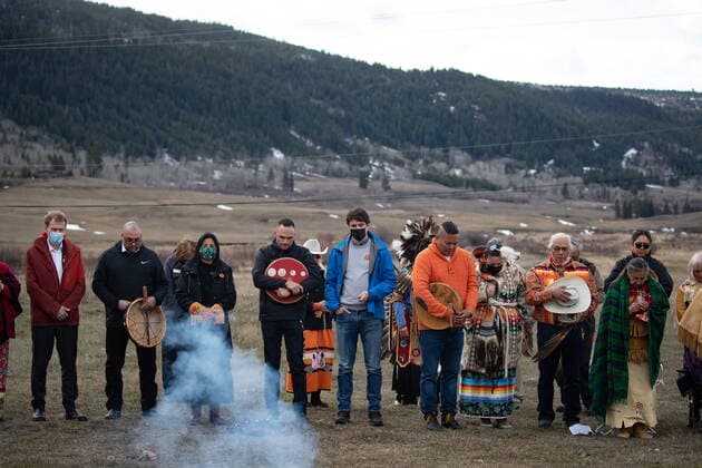 March 30, 2022, WILLIAMS LAKE, BC, CANADA: Prime Minister Justin Trudeau, centre, stands with Williams Lake First Nation Chief Willie Sellars, centre left, during a moment of silence on the former grounds of St. Josephs Mission Residential School, in Williams Lake, B.C., on Wednesday, March 30, 2022. In January, the Williams Lake First Nation announced it had identified 93 reflections that could indicate the number of children buried around the site of the former residential school. WILLIAMS LAKE CANADA  - ZUMAc35_ 20220330_zaf_c35_106 Copyright: xDarrylxDyckx