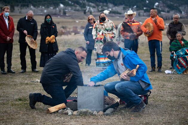 March 30, 2022, WILLIAMS LAKE, BC, CANADA: Prime Minister Justin Trudeau and Williams Lake First Nation Chief Willie Sellars, left, build a ceremonial fire on the former grounds of St. Joseph s Mission Residential School, in Williams Lake, B.C., on Wednesday, March 30, 2022. In January, the Williams Lake First Nation announced it had identified 93 reflections that could indicate the number of children buried around the site of the former residential school. WILLIAMS LAKE CANADA  - ZUMAc35_ 20220330_zaf_c35_107 Copyright: xDarrylxDyckx