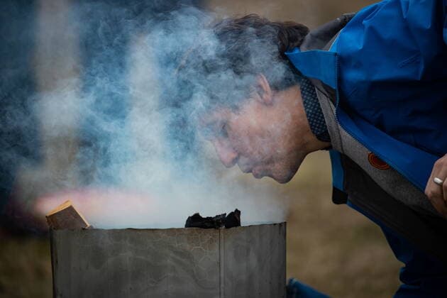 March 30, 2022, WILLIAMS LAKE, BC, CANADA: Smoke rises as Prime Minister Justin Trudeau helps Williams Lake First Nation Chief Willie Sellars start a ceremonial fire on the former grounds of St. Josephs Mission Residential School, in Williams Lake, B.C., on Wednesday, March 30, 2022. In January, the Williams Lake First Nation announced it had identified 93 reflections that could indicate the number of children buried around the site of the former residential school. WILLIAMS LAKE CANADA  - ZUMAc35_ 20220330_zaf_c35_109 Copyright: xDarrylxDyckx