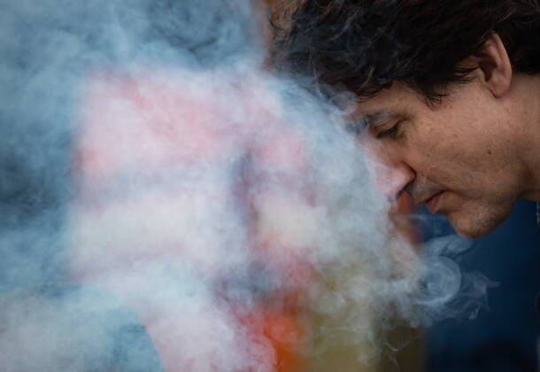 March 30, 2022, WILLIAMS LAKE, BC, CANADA: Smoke rises as Prime Minister Justin Trudeau helps Williams Lake First Nation Chief Willie Sellars build a ceremonial fire on the former grounds of St. Joseph s Mission Residential School, in Williams Lake, B.C., on Wednesday, March 30, 2022. In January, the Williams Lake First Nation announced it had identified 93 reflections that could indicate the number of children buried around the site of the former residential school. WILLIAMS LAKE CANADA  - ZUMAc35_ 20220330_zaf_c35_124 Copyright: xDarrylxDyckx