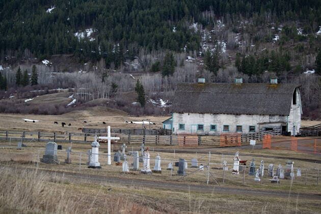 March 30, 2022, WILLIAMS LAKE, BC, CANADA: A cemetery and a barn are seen on the former grounds of St. Joseph s Mission Residential School, in Williams Lake, B.C., on Wednesday, March 30, 2022. In January, the Williams Lake First Nation announced it had identified 93 reflections that could indicate the number of children buried around the site of the former residential school. WILLIAMS LAKE CANADA  - ZUMAc35_ 20220330_zaf_c35_131 Copyright: xDarrylxDyckx