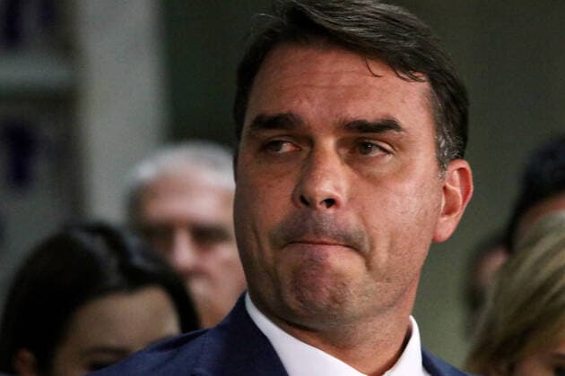 March 30, 2022, Brasilia, Federal District, Brazil: Senator Flavio Bolsonaro gives a press conference alongside federal deputy Daniel Silveira to talk about the decision of Minister Alexandre de Moraes, of the Federal Supreme Court, which determined that the deputy return to use the electronic anklet. During his speech, the son of President Jair Bolsonaro also appealed for something to touch the heart of the STF minister and stressed, in his speech, that Silveira has always been a good guy.  Copyright: xFredericoxBrasilx