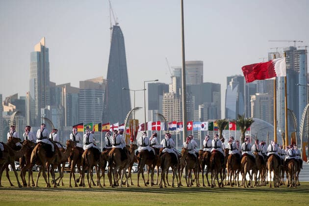 Camels in Qatar Camels and its owners can be seen on the photo in Doha, Qatar on March 31, 2022. Camel races are very popular in Qatar. There are about 22,000 races in Qatar that are used only for racing and about 55,000 in the entire Gulf region. Camels are present on farms, used in the army and for leisure, horseback riding and breeding. IgorxKralj PIXSELL