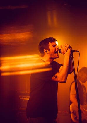 Fontaines D.C. live in Malmoe, Sweden Malmoe, Sweden. 30th, March 2022. The Irish post-punk band Fontaines D.C. performs a live concert at Plan B in Malmoe. Here vocalist Grian Chatten is seen live on stage. Malm? Sweden  Copyright: xGonzalesxPhoto JoexMillerx