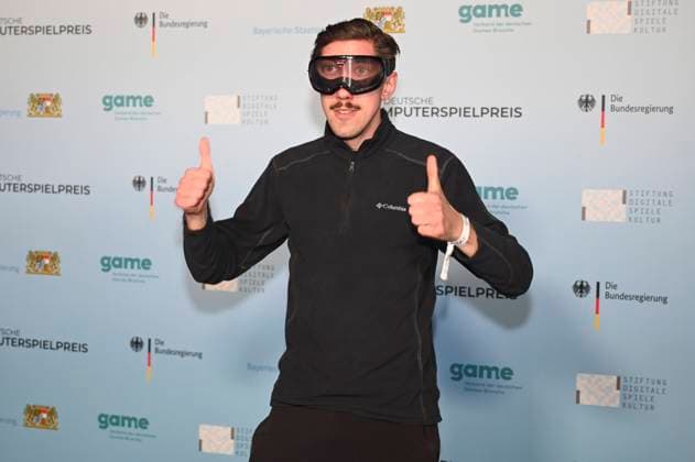Maximilian Knabe bei der Verleihung des Deutschen Computerspielpreises 2022 in der TonHalle. München, 31.03.2022