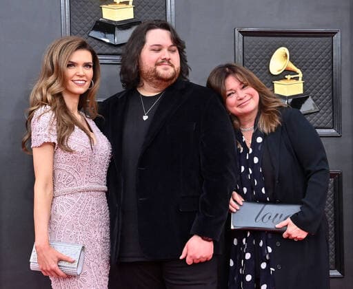 Andraia Allsop, Wolfgang Van Halen and Valerie Bertinelli arrive for the 64th annual Grammy Awards at the MGM Grand Garden Arena in Las Vegas, Nevada on Sunday, April 3, 2022.  LAV20220403300 JIMxRUYMEN