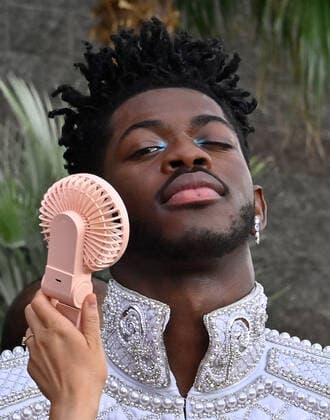 Lil Nas X arrives for the 64th annual Grammy Awards at the MGM Grand Garden Arena in Las Vegas, Nevada on Sunday, April 3, 2022.  LAV20220403488 JIMxRUYMEN