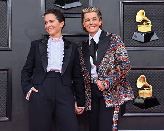 Catherine Shepherd and Brandi Carlile arrive for the 64th annual Grammy Awards at the MGM Grand Garden Arena in Las Vegas, Nevada on Sunday, April 3, 2022.  LAV20220403579 JIMxRUYMEN