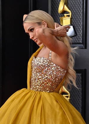Carrie Underwood arrives for the 64th annual Grammy Awards at the MGM Grand Garden Arena in Las Vegas, Nevada on Sunday, April 3, 2022.  LAV20220403599 JIMxRUYMEN