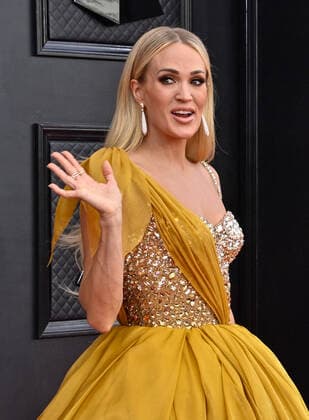 Carrie Underwood arrives for the 64th annual Grammy Awards at the MGM Grand Garden Arena in Las Vegas, Nevada on Sunday, April 3, 2022.  LAV20220403621 JIMxRUYMEN