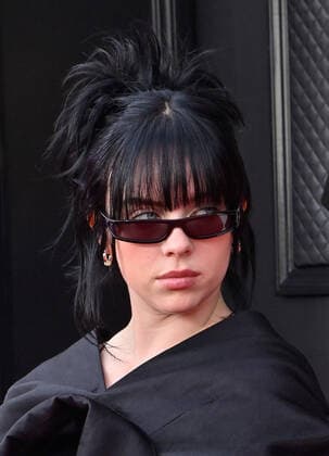 Billie Eilish arrives for the 64th annual Grammy Awards at the MGM Grand Garden Arena in Las Vegas, Nevada on Sunday, April 3, 2022.  LAV20220403540 JIMxRUYMEN