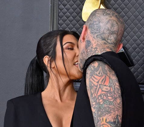 Kourtney Kardashian and Travis Barker arrive for the 64th annual Grammy Awards at the MGM Grand Garden Arena in Las Vegas, Nevada on Sunday, April 3, 2022.  LAV20220403948 JIMxRUYMEN