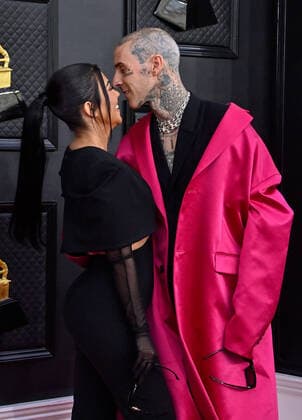 Kourtney Kardashian and Travis Barker arrive for the 64th annual Grammy Awards at the MGM Grand Garden Arena in Las Vegas, Nevada on Sunday, April 3, 2022.  LAV20220403933 JIMxRUYMEN