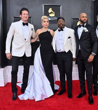 Brian Newman, Lady Gaga, Michael Bearden and Donald Barrett arrive for the 64th annual Grammy Awards at the MGM Grand Garden Arena in Las Vegas, Nevada on Sunday, April 3, 2022.  LAV20220403956 JIMxRUYMEN
