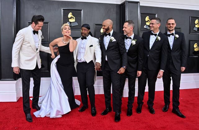 Brian Newman, Lady Gaga, Michael Bearden and Donald Barrett arrive for the 64th annual Grammy Awards at the MGM Grand Garden Arena in Las Vegas, Nevada on Sunday, April 3, 2022.  LAV20220403970 JIMxRUYMEN