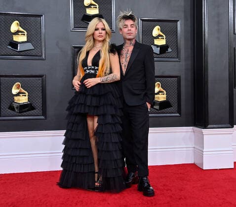 Avril Lavigne and Mod Sun arrive for the 64th annual Grammy Awards at the MGM Grand Garden Arena in Las Vegas, Nevada on Sunday, April 3, 2022.  LAV202204031002 JIMxRUYMEN