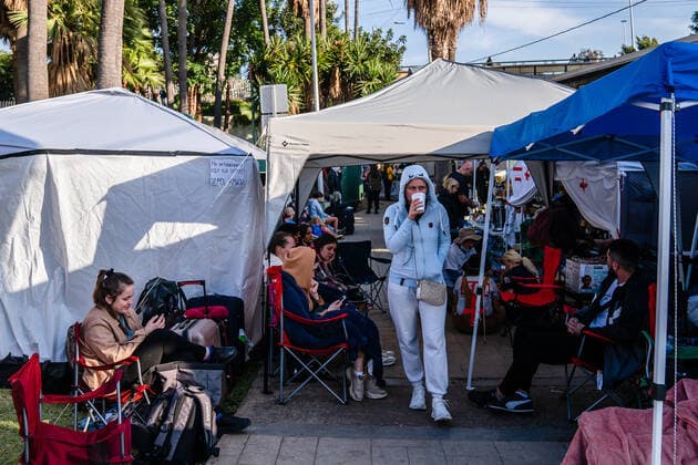 Ukrainians who fled to Mexico amid Russia s invasion of Ukraine wait at a makeshift camp near the San Ysidro Port of Entry of the U.S.-Mexico border on Monday, April 4, 2022 in Tijuana, Mexico. The refugees are given a number so they do not have to wait in line as the United States said they will accept 100,000 Ukrainian refugees due to the Russian invasion of Ukraine.  MEX2022040425 ARIANAxDREHSLER