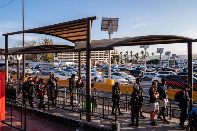 Ukrainians who fled to Mexico amid Russia s invasion of Ukraine wait in front of the San Ysidro Port of Entry of the U.S.-Mexico border on Monday, April 4, 2022 in Tijuana, Mexico. The refugees are given a number so they do not have to wait in line as the United States said they will accept 100,000 Ukrainian refugees due to the Russian invasion of Ukraine.  MEX2022040414 ARIANAxDREHSLER