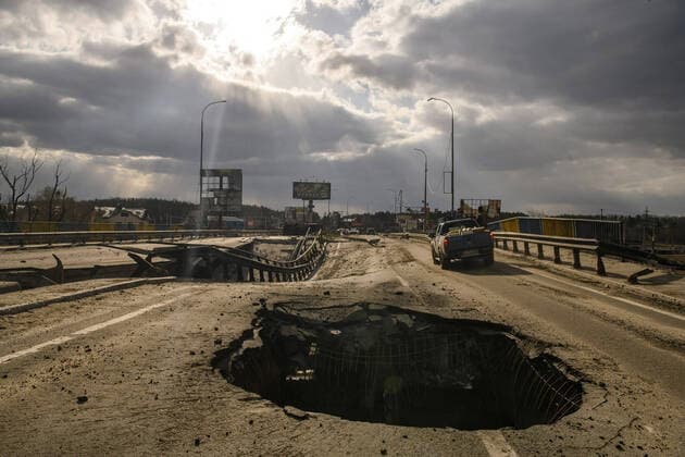 A destroyed bridge in the recaptured city of Bucha, northwest of the Ukrainian capital Kyiv, on Monday. April 4, 2022. Ukraine and Western nations accused Russian troops of war crimes after the discovery of the mass graves and civilians who were apparently executed in Bucha.  KYV20220405161 VladyslavxMusienko
