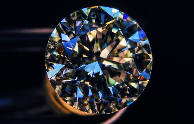 SMOLENSK, RUSSIA - APRIL 6, 2022: A view of a cut diamond under a microscope at a production line of the Kristall Production Corporation, one of the world s leading polished diamonds manufacturers. On March 11, the United States issued an order banning the import of non-industrial Russian diamonds into the US. Vladimir Smirnov TASS  TS12B80B
