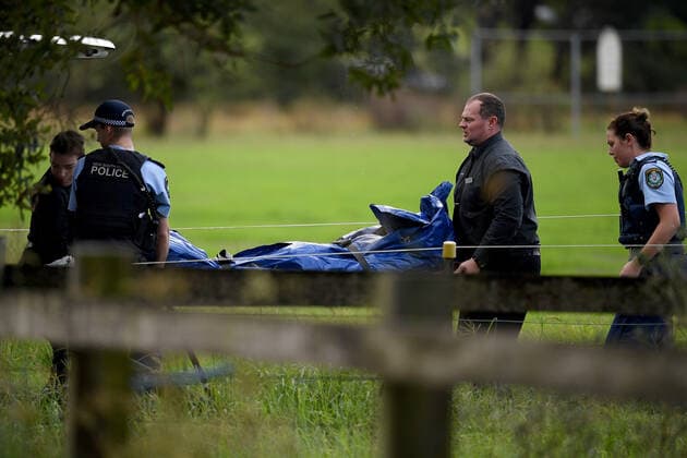 WET WEATHER DEATH NSW, The body of a man who died in floodwater is transferred to a Coroner s vehicle at Cobbity, south west of Sydney, Friday, April 8, 2022. A 68 year old man was found in a submerged van around 8am Friday. ( NO ARCHIVING, EDITORIAL USE ONLY, NO USE IN BOOKS WITHOUT CONSENT SYDNEY NSW AUSTRALIA  Copyright: xDANxHIMBRECHTSx 20220408001644877483