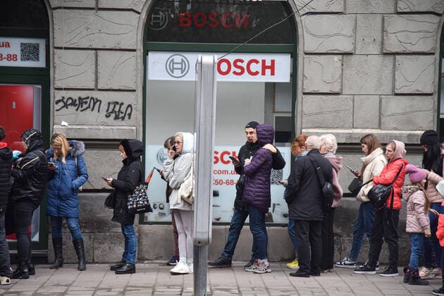 March 31, 2022, Lviv, Ukraine: People stand in a line at the UN refugee office in Lviv to register as refugees due to Russia s military invasion of Ukraine. The UN Office for Refugees, which registers refugees from Russian military aggression in Ukraine, has opened in Lviv. Each refugee will receive 2,200 hryvnias (equivalent to $ 80) from the UN each month for three months. Currently, such offices operate only in three Ukrainian cities - Lviv, Uzhhorod, and Mukachevo. Lviv Ukraine - ZUMAs197 20220331_zab_s197_097 Copyright: xPavloxPalamarchukx