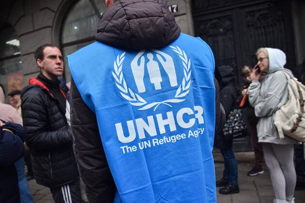 March 31, 2022, Lviv, Ukraine: An employee of the UN Refugee Office in Lviv advises people who want to register as refugees due to the Russian military invasion of Ukraine. The UN Office for Refugees, which registers refugees from Russian military aggression in Ukraine, has opened in Lviv. Each refugee will receive 2,200 hryvnias (equivalent to $ 80) from the UN each month for three months. Currently, such offices operate only in three Ukrainian cities - Lviv, Uzhhorod, and Mukachevo. Lviv Ukraine - ZUMAs197 20220331_zab_s197_102 Copyright: xPavloxPalamarchukx