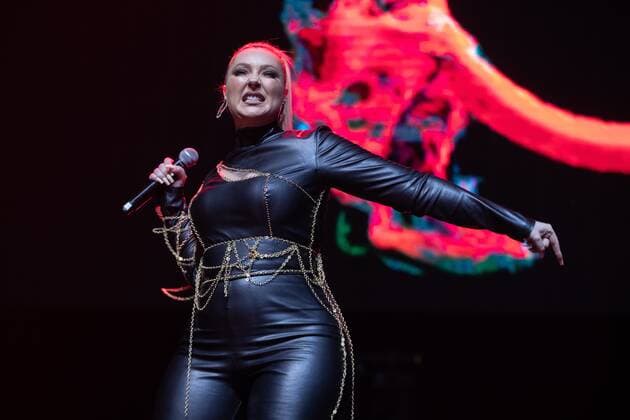 2022-04-09 20:02:49 AMSTERDAM - Singer Ronela Hajati performs with the song Sekret on behalf of Albania during Eurovision in Concert in AFAS Live. Several artists will perform during this concert who will participate in the festival in May. ANP PAUL BERGEN netherlands out - belgium out
