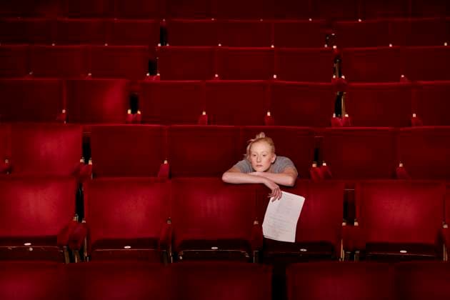 Woman With Script At Theatre Stall, model released, , 10127280.jpg, Actress, Adult, Arms Crossed, Arts, Attractive, Audition, Auditorium, Beautiful, Blonde, Bored, Building, Casual, Caucasian, Contemplation, Dejected, Demoralised, Disheartened, Entertainment, Event, Holding, Indoors, Interior, Leaning, Looking Away, Margate, One, Paper, Pensive, Performer, Person, Red, Rejected, Rejection, Script, Seat, Seating, Show, Sitting, Stall, Theater, Theatre, Thinking, Thoughtful, Velvet, Venue, Waiting, Woman, Young, 20s,