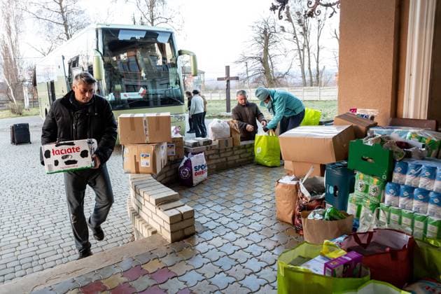 Shelter For Internal Refugees In Ukraine Volunteers carry parcels delivered by a volunteering business - Abdar Travel Agency from Krakow, Poland to a house temporarily transferred into a shelter for women with children run by Greek-Catholich Church in Nadyby, near Lviv, Ukraine on April 12, 2022. Since the Russian Federation invaded Ukraine, the conflict forced over 10 million people to flee their homes, both internally and externally. Many Polish NGOs and individuals provide help for the displaced. Abdar travel agency is a business run by mixed marriage - Ukrainian Olga and Polish Maciej Oszal. Since the beginning of the conflict the couple engaged in delivering humanitarian help. They drive a coach to Lviv to deliver goods and to  Copyright: xDominikaxZarzyckax originalFilename: zarzycka-polishci220412_npaep.jpg