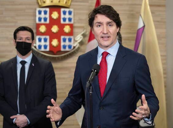 April 13, 2022, Laval, PQ, Canada: Prime Minister Justin Trudeau speaks to the media as Laval Mayor Stephane Boyer looks on during a news conference Wednesday, April 13, 2022 in Laval, Que. Laval Canada  - ZUMAc35_ 20220413_zaf_c35_047 Copyright: xRyanxRemiorzx