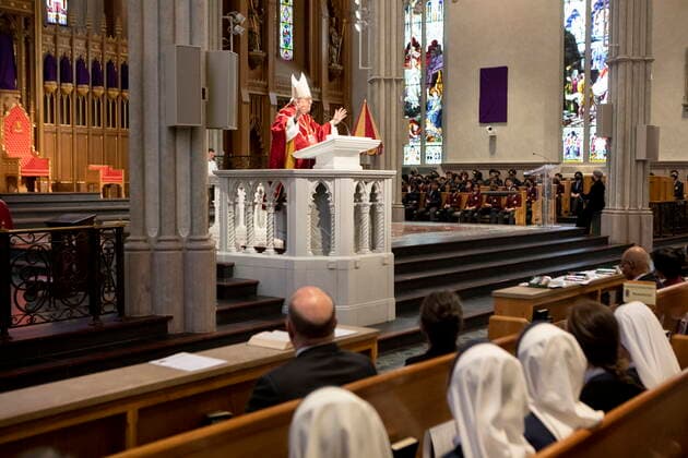 April 15, 2022, Toronto, ON, CAN: Cardinal Thomas Collins, the Archbishop of Toronto, stands in the pulpit as he delivers a sermon to worshippers during a Good Friday service at St. Michael s Cathedral Basilica, in Toronto, Friday, April 15, 2022. Toronto CAN - ZUMAc35_ 20220415_zaf_c35_005 Copyright: xChrisxYoungx