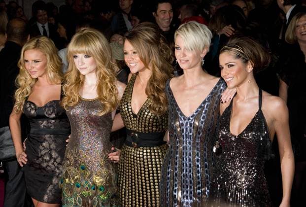 St Trinians World Premiere at the Empire Leicester Square on December 10, 2007 in London, England. , 351015.jpg, st trinians, leicester square, london, premiere, girls aloud, sarah harding, cheryl cole, nadine coyle, nicola roberts, kimberley walsh, curl, mini dress, waistband, waistbelt, paillette detail, floral print, metallic balls hem, black, brown, copper detail, bleach, brown, gold, deep v-shape, chain detail, earrings, cross, hairband, headband, black, tanned, bronze, stocklings,