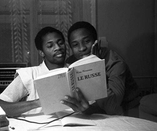 Foreign students 5781864 14.02.1973 Lomonosov Moscow State University. Students from Togo read a Russian language textbook. N. Maksimov Moscow Russia  Copyright: xN.xMaksimovx