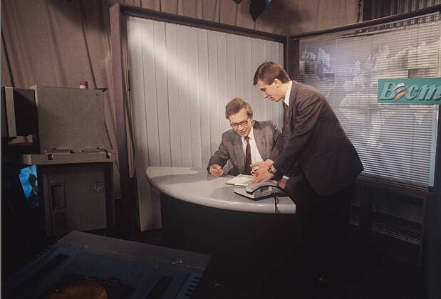 Newscasters Alexander Shashkov also Mikhail Ponomaryov 3124533 01.04.1994 The Russian State Television and Radio Broadcasting Company. The Vesti TV newscasters Alexander Shashkov (sitting) also Mikhail Ponomaryov. Vitaliy Saveliev Sputnik Moscow Russia  Copyright: xVitaliyxSavelievx