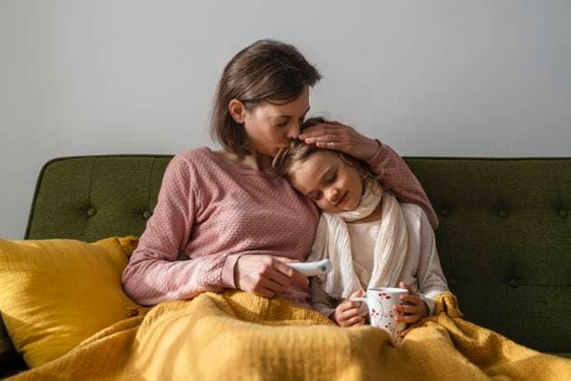 Mother embracing sick daughter at home model released, Symbolfoto property released, DIGF17729