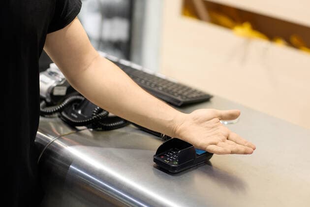 EXCLUSIVE VIDEO AVAILABLE: CONTACT INFO@COVERMG.COM The future of wireless payments is here - as tech enthusiasts can now get a chip implanted under their skin that means they can order drinks or complete the weekly shop with just a swipe of their hand. British-Polish firm Walletmor offers to implant the chips beneath the skin in customers? hands for as little as â?¬199. It weighs less than a gram, is little bigger than a grain of rice - and is comprised of a tiny secure microchip and an antenna encased in a biopolymer. Founder and chief executive Wojtek Paprota says: We are the first and only company on Earth that has designed payment implants that are fully biosafe, fully secure, and globally available. The difference between Copyright: xx 51454125 EDITORIAL USE ONLY. NOT FOR USE BY NEWSPAPERS BASED IN THE UK.