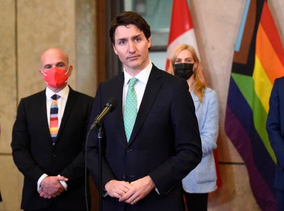 April 28, 2022, Ottawa, ON, CAN: Prime Minister Justin Trudeau stands with Minister of Tourism Randy Boissonnault and and Minister of Sport Pascale St-Onge during an announcement on the ending of the Canadian Blood ServicesöÄÃ blood ban, in Ottawa, on Thursday, April 28, 2022. Ottawa CAN  - ZUMAc35_ 20220428_zaf_c35_019 Copyright: xJustinxTangx