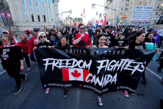 April 29, 2022, Ottawa, ON, CANADA: Protesters march during a demonstration, part of a convoy-style protest participants are calling Rolling Thunder , in Ottawa, Friday, April 29, 2022. Ottawa CANADA  - ZUMAc35_ 20220429_zaf_c35_080 Copyright: xSeanxKilpatrickx