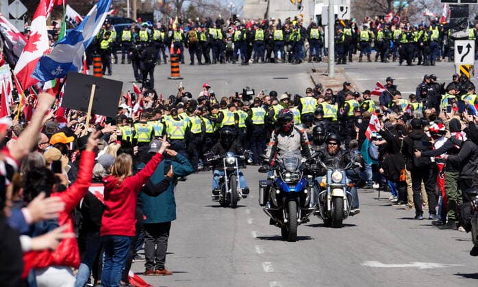 April 30, 2022, Ottawa, ON, CANADA: Participants cheer on protesters riding motorcycles during a demonstration, part of a convoy-style protest participants are calling Rolling Thunder , in Ottawa, Saturday, April 30, 2022. Ottawa CANADA  - ZUMAc35_ 20220430_zaf_c35_037 Copyright: xSeanxKilpatrickx
