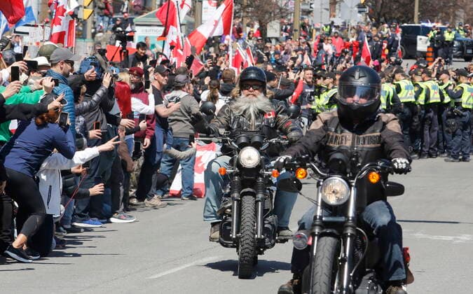 April 30, 2022, Ottawa, ON, Canada: Demonstrators on motorcycles ride near the National War Memorial, part of a convoy-style protest participants are calling Rolling Thunder , in Ottawa, on Saturday, April 30, 2022. Ottawa Canada  - ZUMAc35_ 20220430_zaf_c35_045 Copyright: xPatrickxDoylex