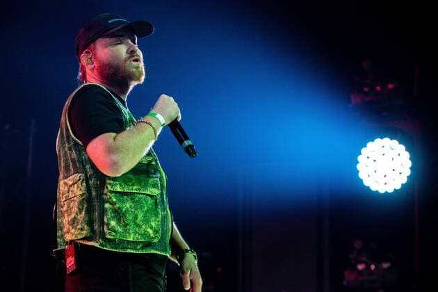 2022-04-30 19:45:41 AMSTERDAM - Rapper Donnie during his concert in AFAS Live. The rapper was later joined during the performance by guest artists such as Rene Froger, Frans Duijts, Willie Wartaal and Vjeze Fur. ANP PAUL BERGEN netherlands out - belgium out