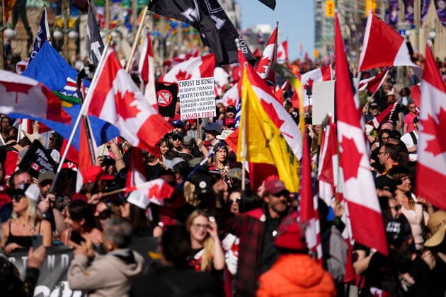 April 30, 2022, Ottawa, ON, CANADA: Protesters gather and wave flags during a demonstration, part of a convoy-style protest participants are calling Rolling Thunder , in Ottawa, Saturday, April 30, 2022. Ottawa CANADA  - ZUMAc35_ 20220430_zaf_c35_121 Copyright: xSeanxKilpatrickx
