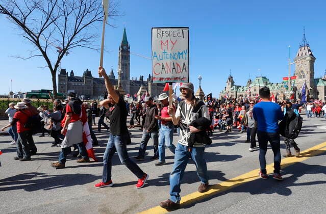 April 30, 2022, Ottawa, ON, Canada: People take part in a demonstration in front of Parliament Hill, part of a convoy-style protest participants are calling Rolling Thunder , in Ottawa, on Saturday, April 30, 2022. Ottawa Canada  - ZUMAc35_ 20220430_zaf_c35_165 Copyright: xPatrickxDoylex