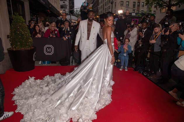 May 2, 2022, New York, United States: Dwyane Wade and Gabrielle Union depart The Mark Hotel for 2022 Met Gala in New York City. New York United States - ZUMAs197 20220502_zaa_s197_458 Copyright: xRonxAdarx