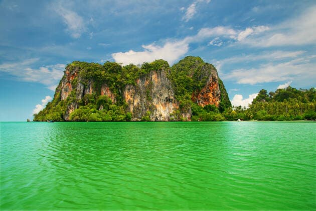 Creative Highlights World High cliffs on the tropical island. Exotic tropical landscape. , 2377627.jpg, tropical, beach, climate, island, krabi, rock, sky, sea, beauty, blue, scene, landscape, bay, nautical, summer, seascape, water, nature, travel, tranquil, asia, turquoise, lagoon, relaxation, thailand, green, idyllic, recreational, formation, tree, cliff, mountain, exploration, outdoor, shore, ko,